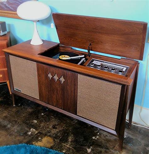 This is a vintage mid century modern Scandinavian Design by Torbjorn Afdal. . 1960s record player cabinet